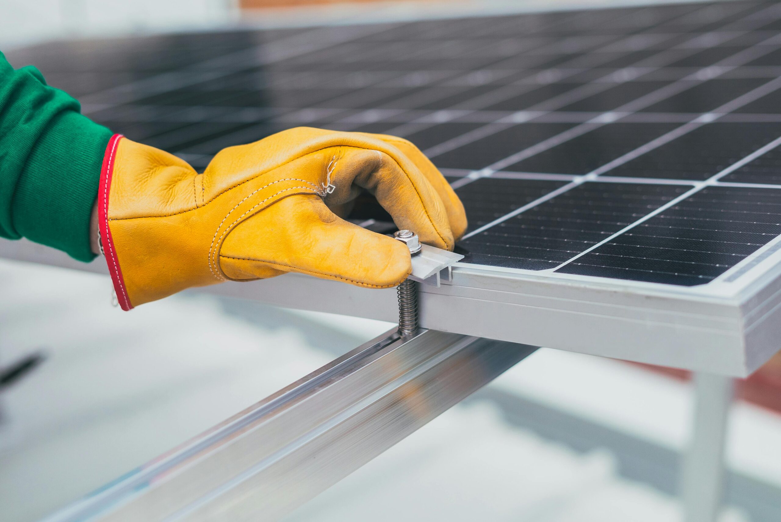 Screwing Solar Panel Screwing into a solar panel during installation.