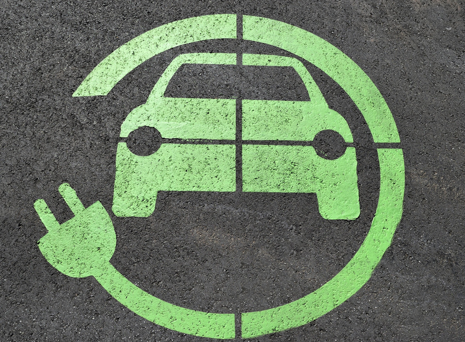 EV Emblem Painted On The Tarmac Indicating Charging Spot
