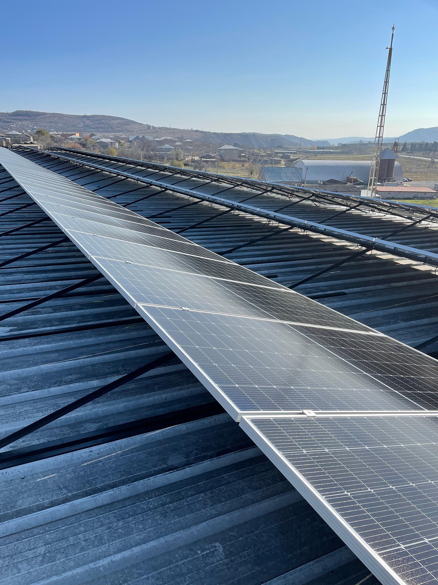 Commercial Solar Panels With a View Towards Water Commercial Solar Panels With a View Towards Water