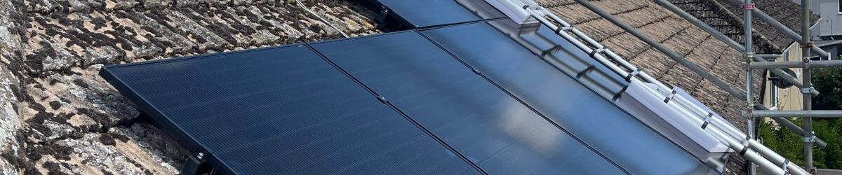 Solar First installation of solar panel upgrades on a house.