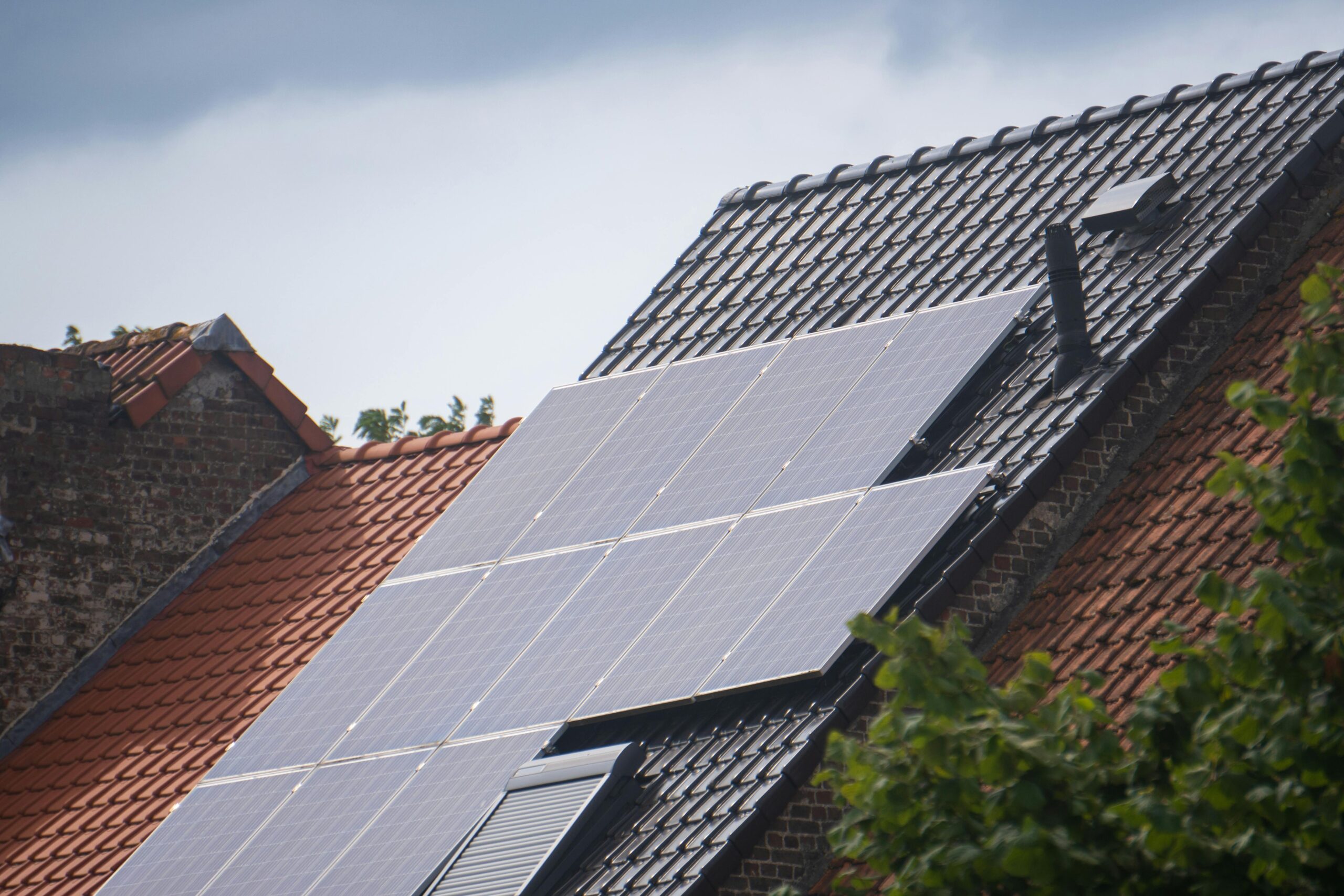 A full set of solar panels on a roof of a property. A full set of solar panels on a roof of a property.