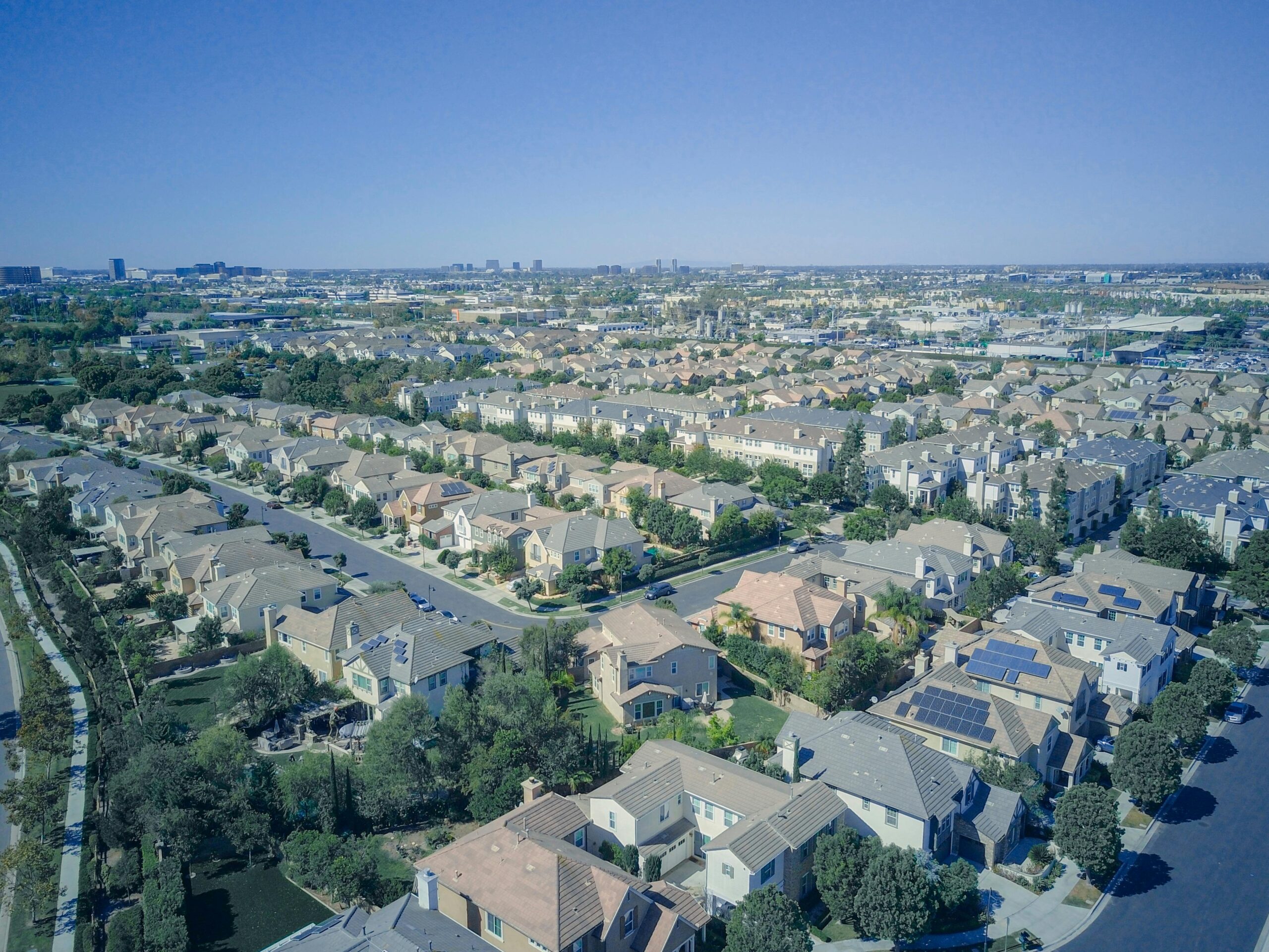 Solar panles on the roof of some houses in an urban area. Solar panels on the roof of some houses in an urban area.